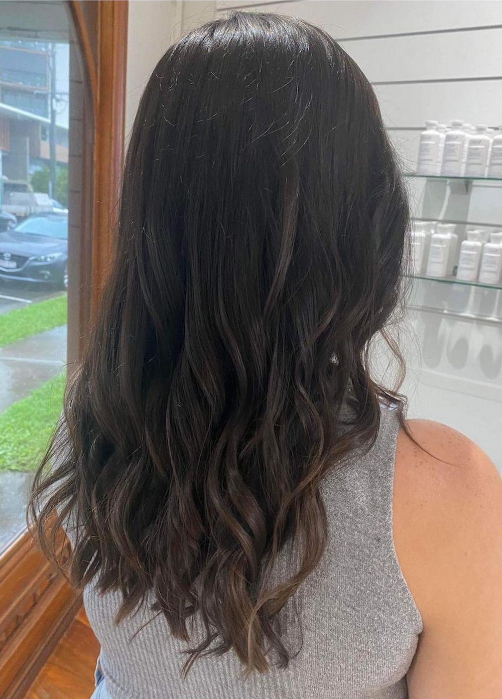 Woman With Dark, Wavy Hair, Facing Away From the Camera — Strut Hair & Beauty In Maroochydore, QLD