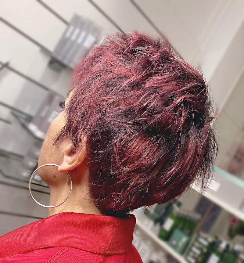 Woman With Short, Burgundy Hair and Hoop Earrings, Wearing a Red Top — Strut Hair & Beauty In Maroochydore, QLD