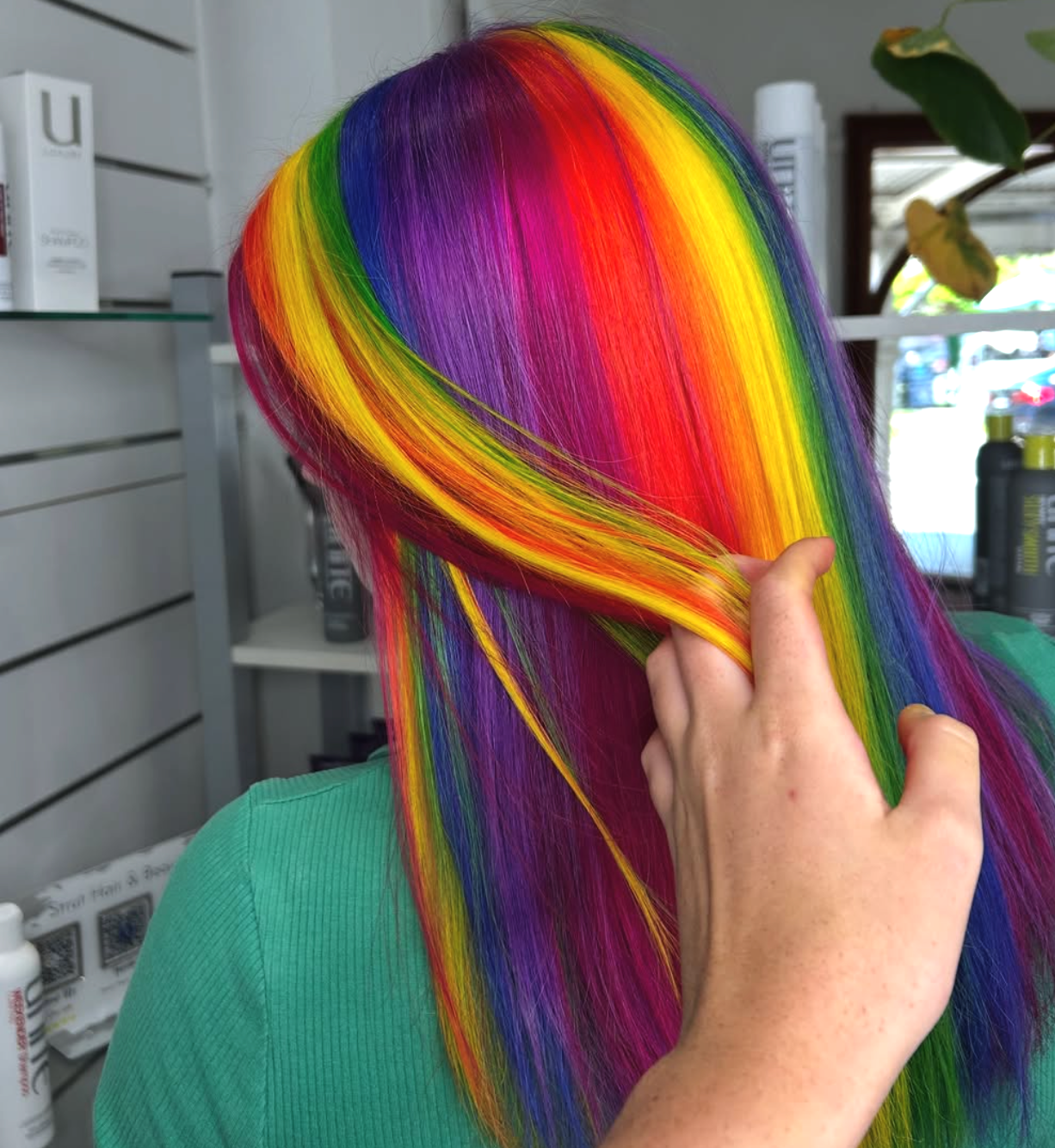 Person with Vibrant Hair Coloured Rainbow