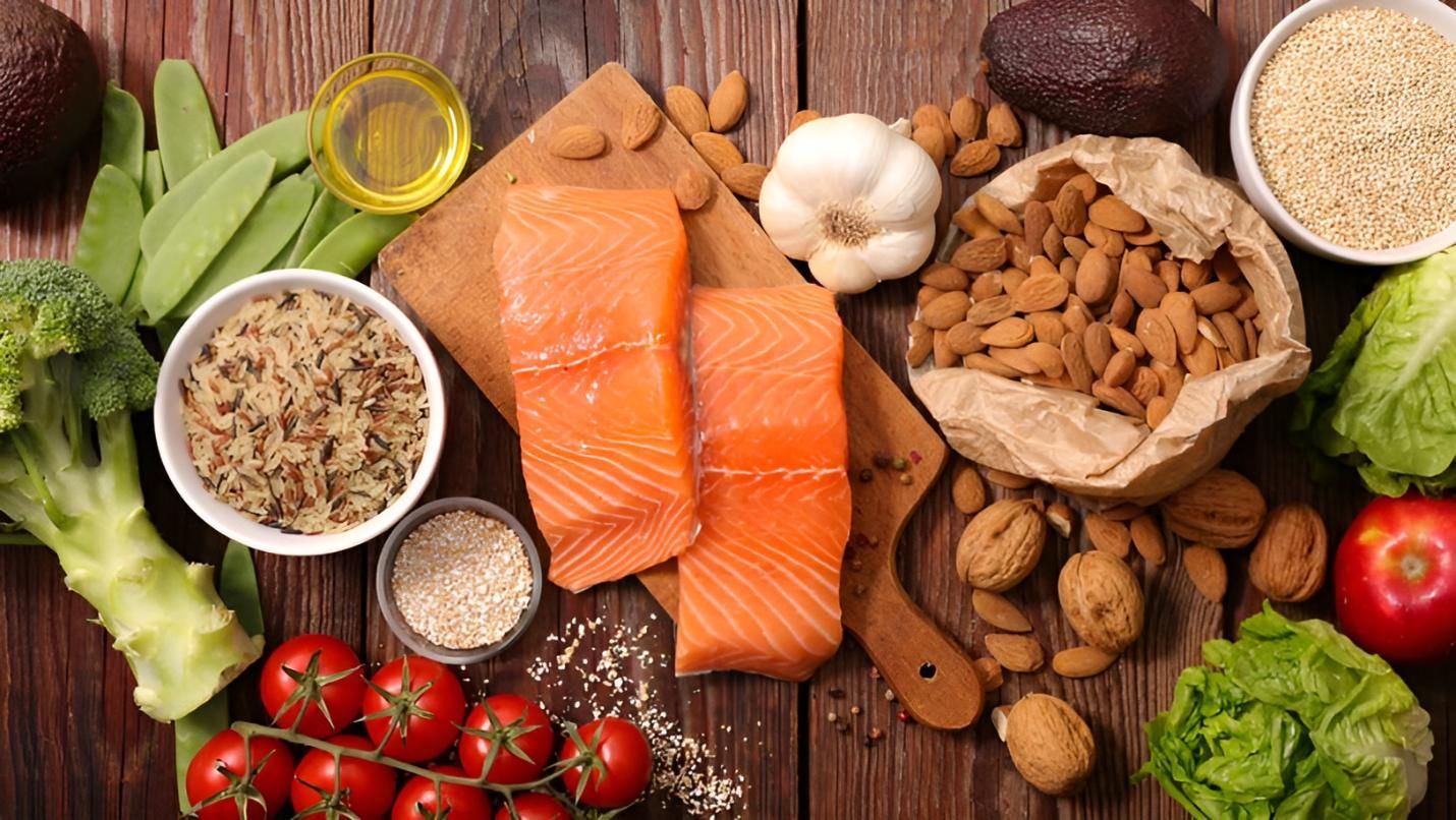 A Wooden Table Topped With a Variety of Healthy Foods — Strut Hair & Beauty In Maroochydore, QLD