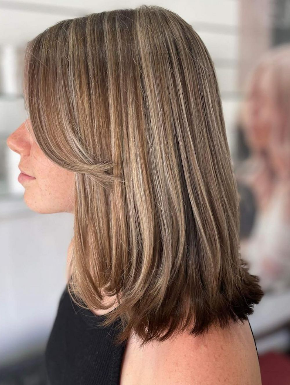 Woman With Medium-length Brown Hair, Side-swept Bangs, and Blonde Highlights — Strut Hair & Beauty In Maroochydore, QLD