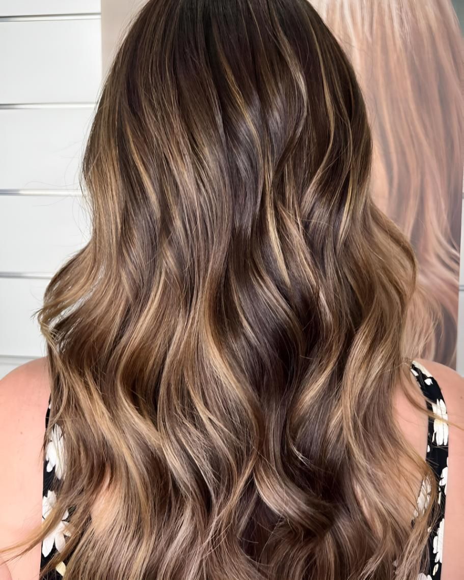 The Back of a Woman 's Head With Long Wavy Brown Hair — Strut Hair & Beauty In Maroochydore, QLD