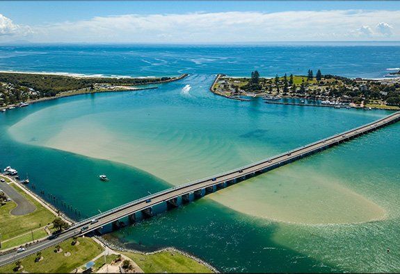 Aerial view of bridge and clean water — Audiomation in Forster, NSW