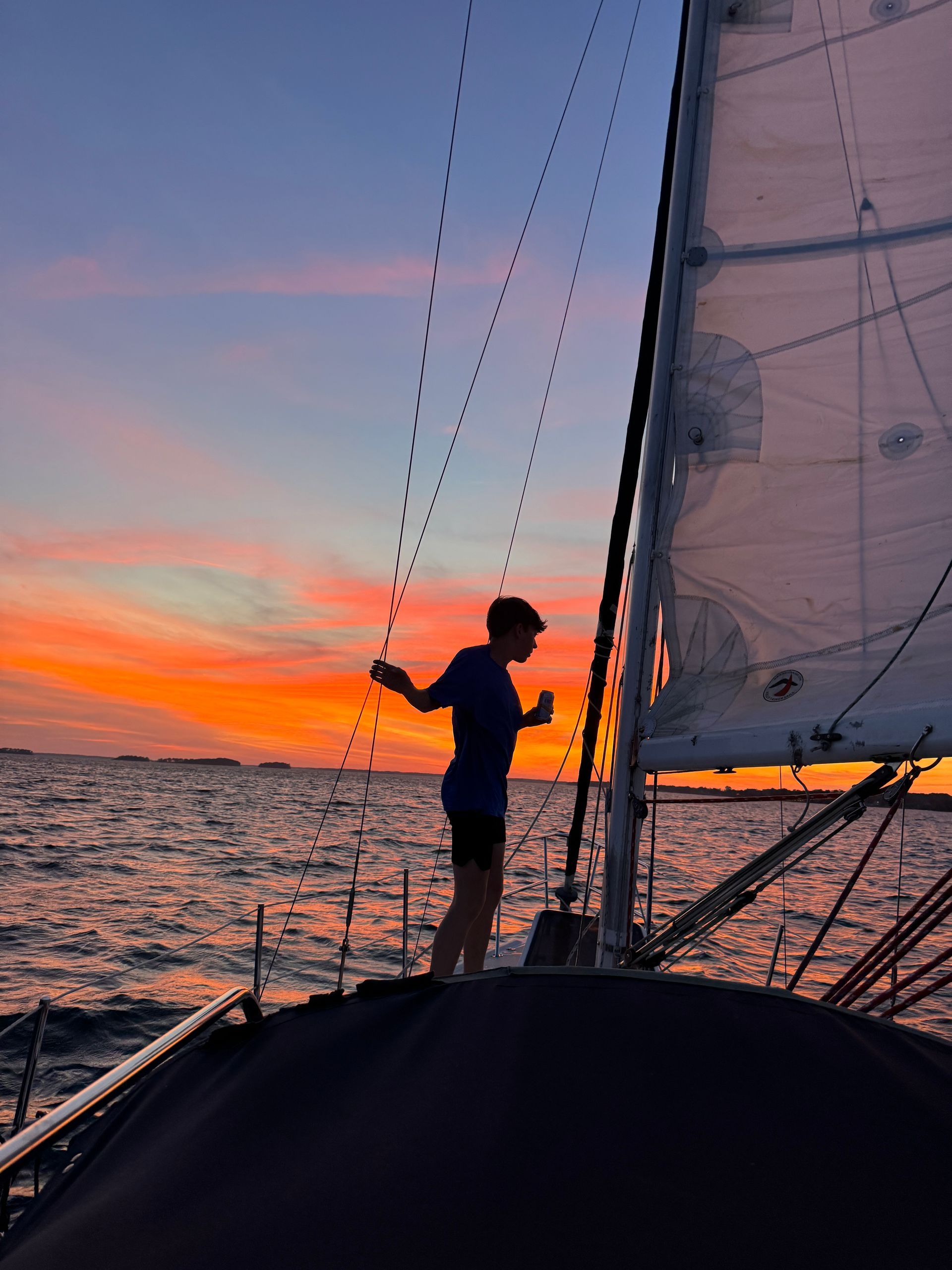 Image of a woman sitting on a SUP on a sunny day on Lake Murray, Columbia, SC