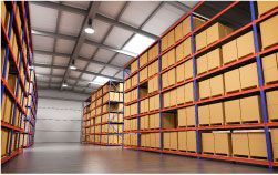 A large warehouse filled with lots of cardboard boxes on shelves.