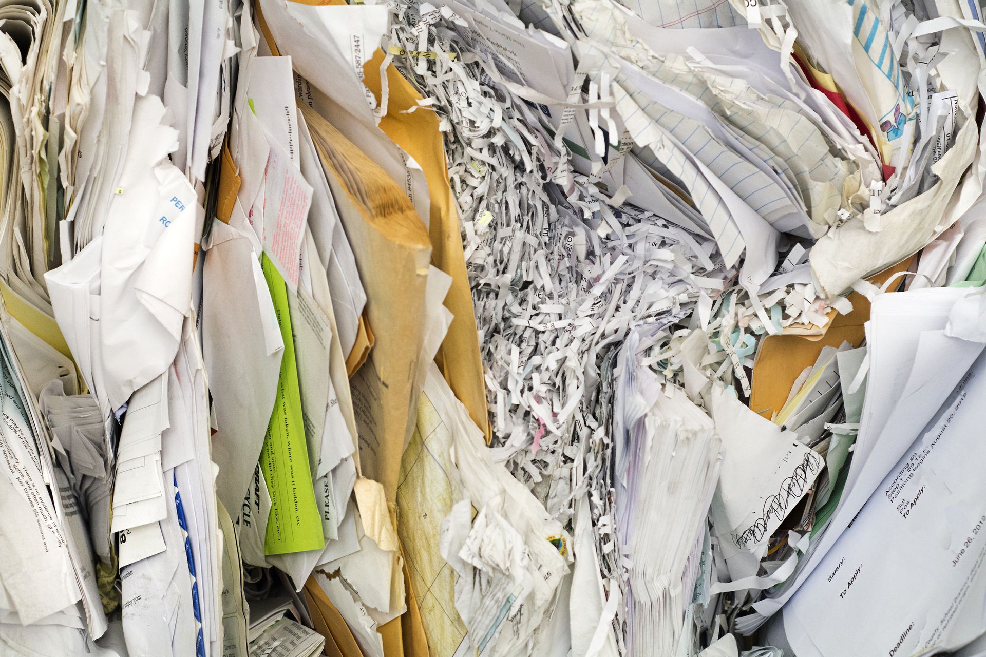 A pile of shredded paper is sitting on a table.