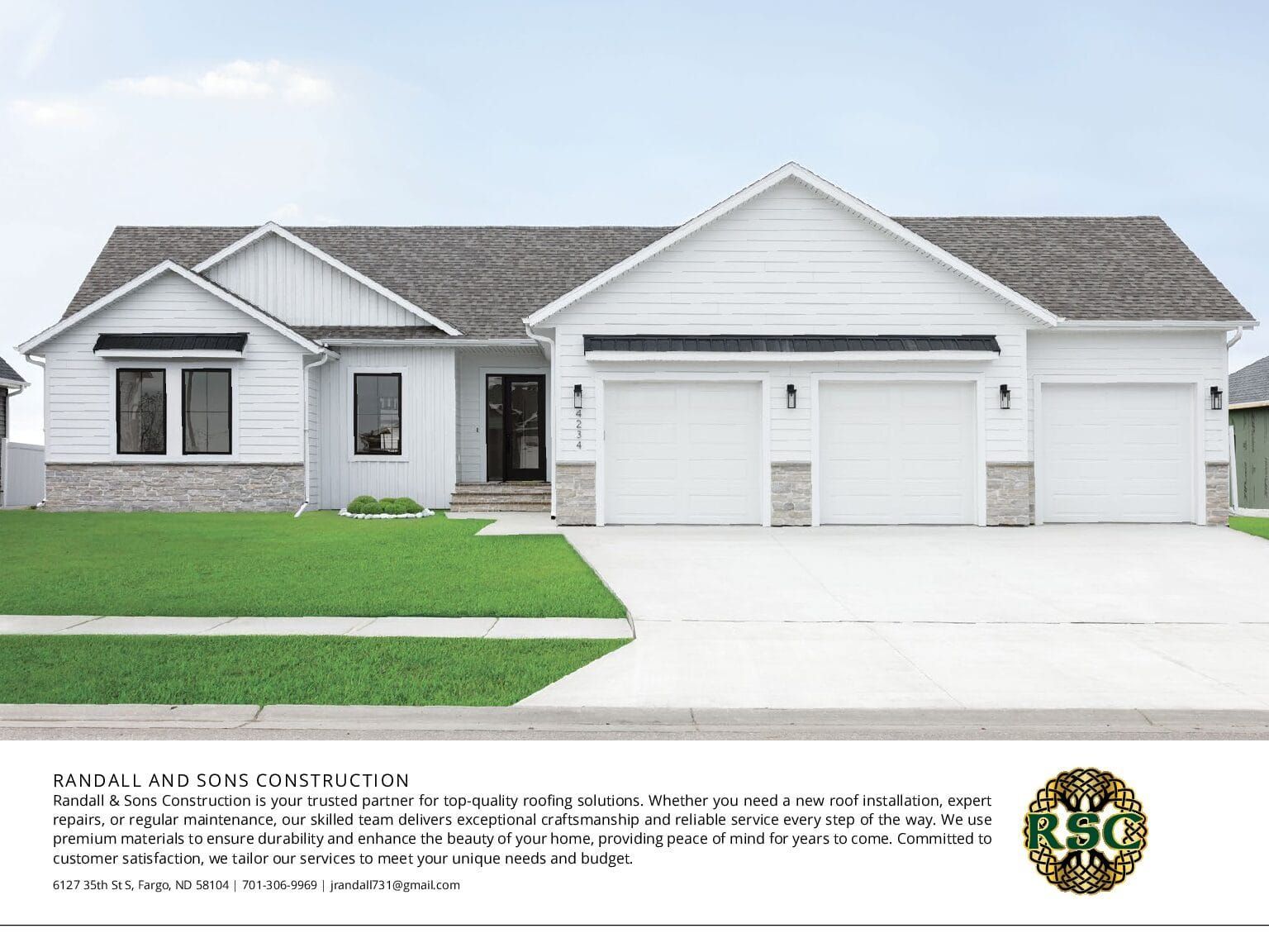 White house with three-car garage and stone accents on a green lawn.