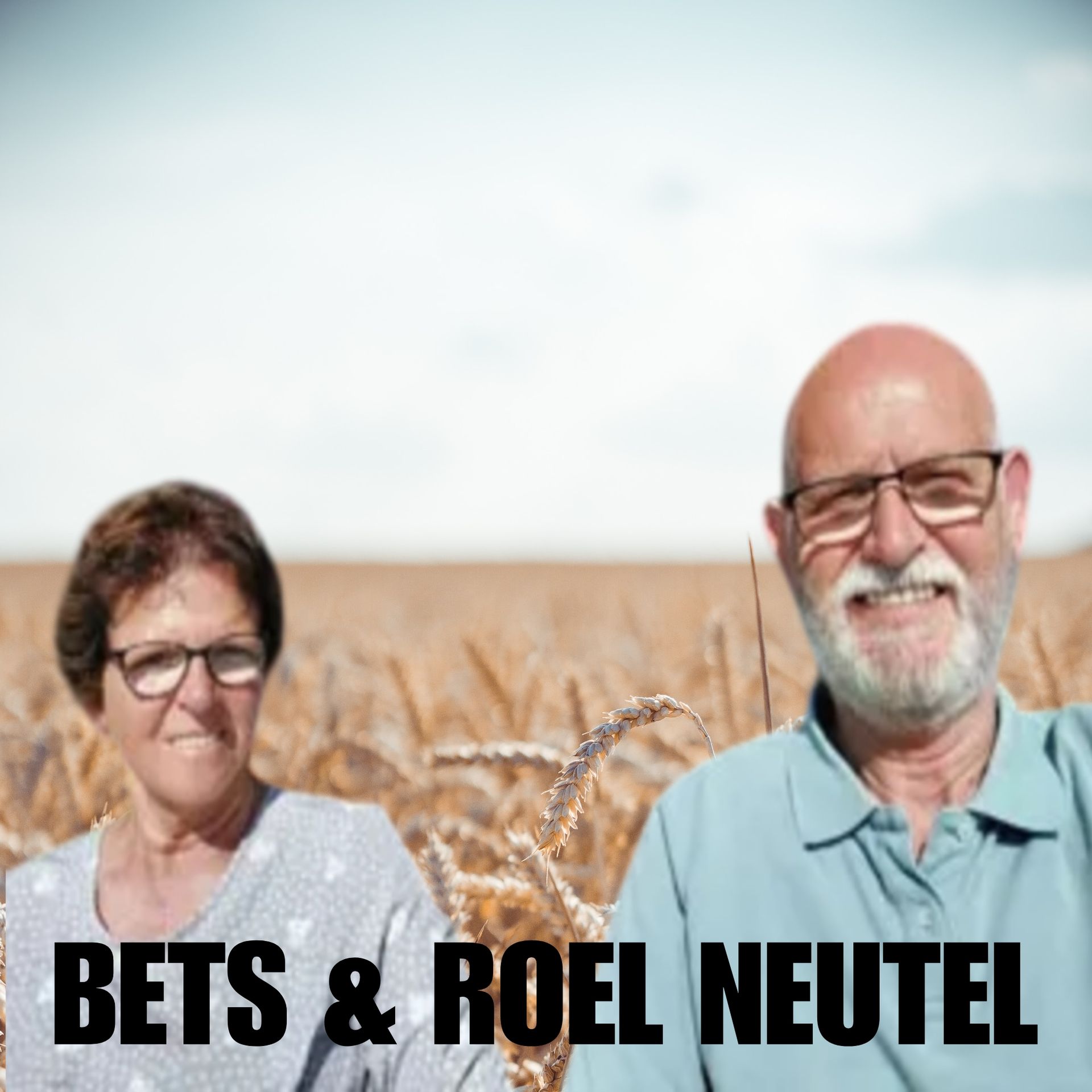 Twee mensen, Bets en Roel Neutel, lachend in een tarweveld.