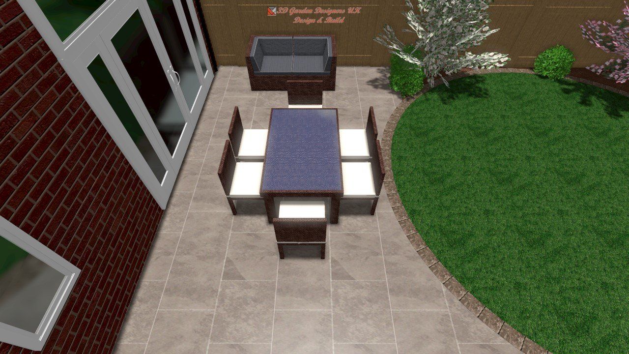 An aerial view of a patio with a table and chairs