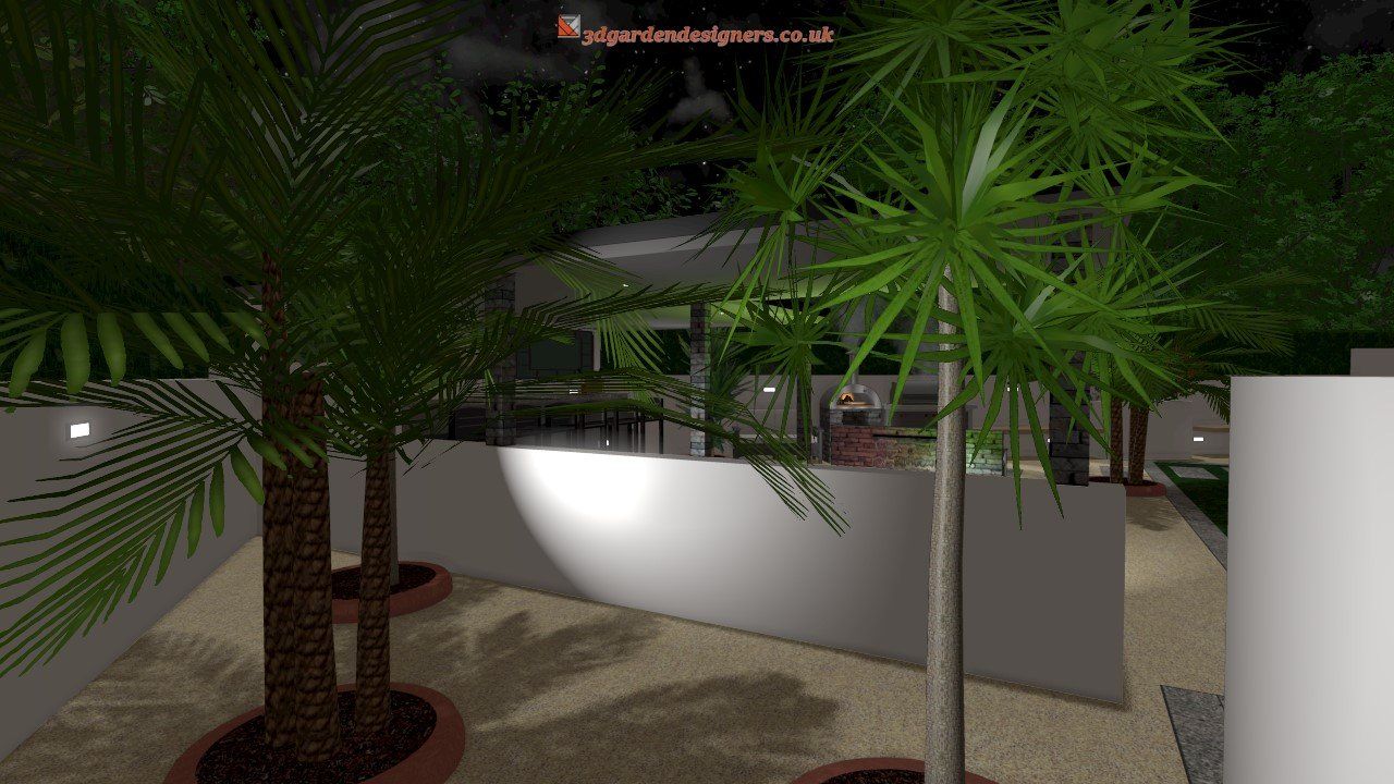 A couple of palm trees in pots in a garden at night.