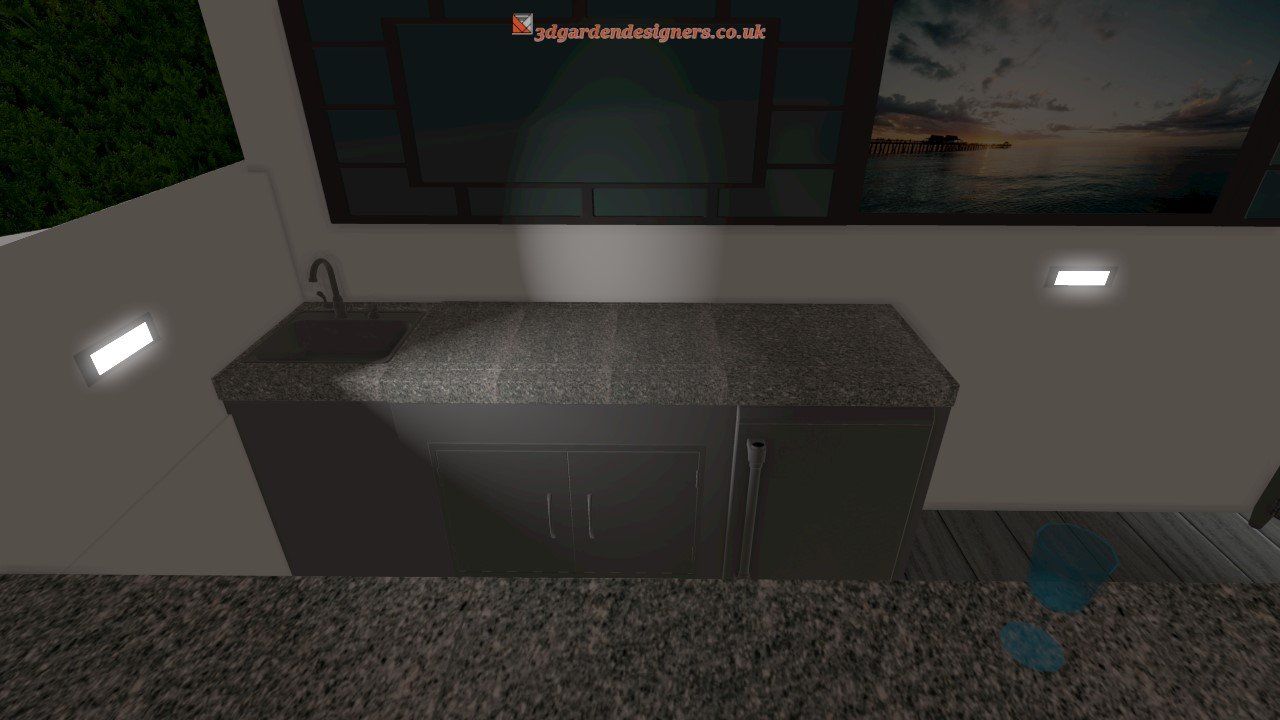 A kitchen counter with a sink and a picture on the wall.