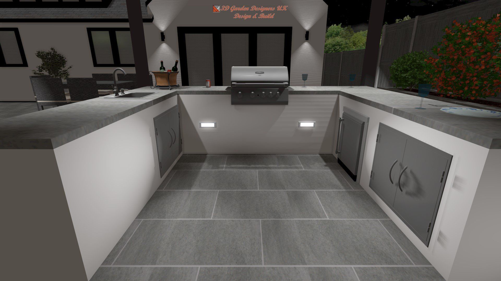 A large outdoor kitchen with a grill and a sink.