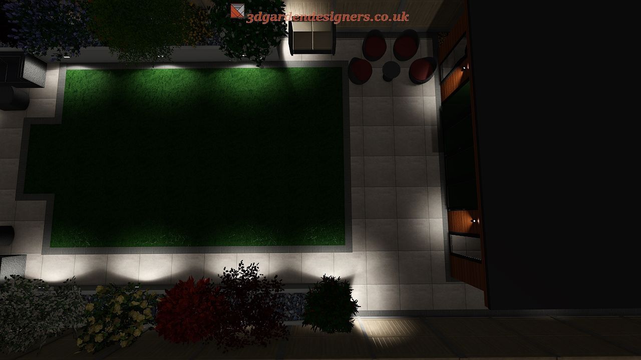 Overhead nighttime view of a lit garden with a lawn, plants, patio, and spotlights.