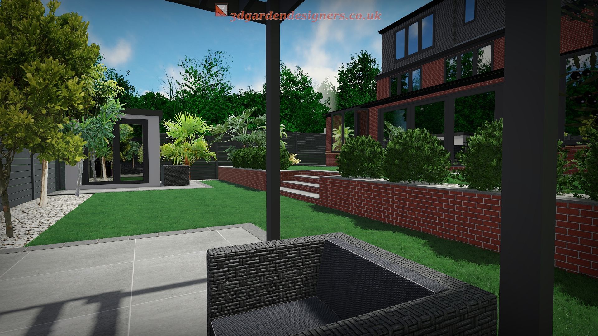 Modern backyard with grass, patio, brick walls, dark furniture, and contemporary house.