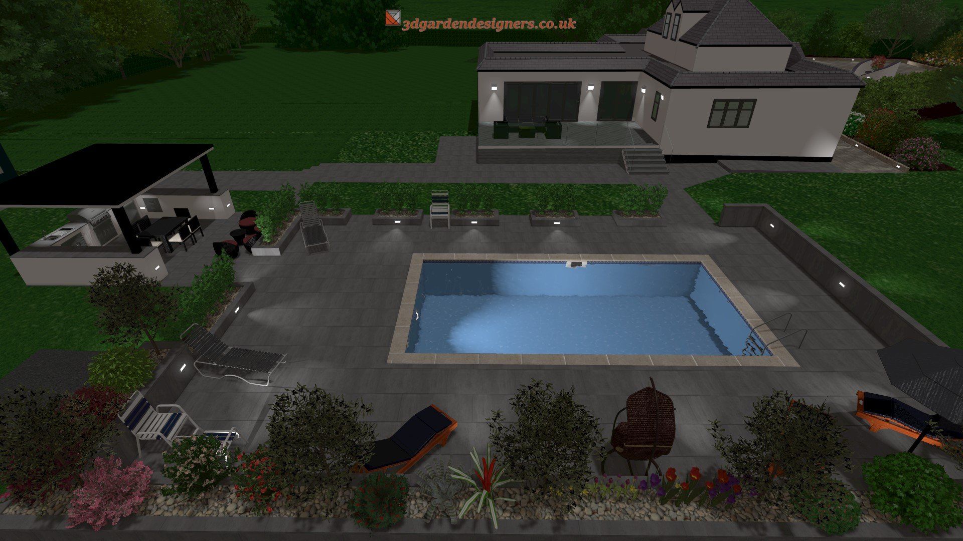 An aerial view of a house with a swimming pool in the backyard at night.