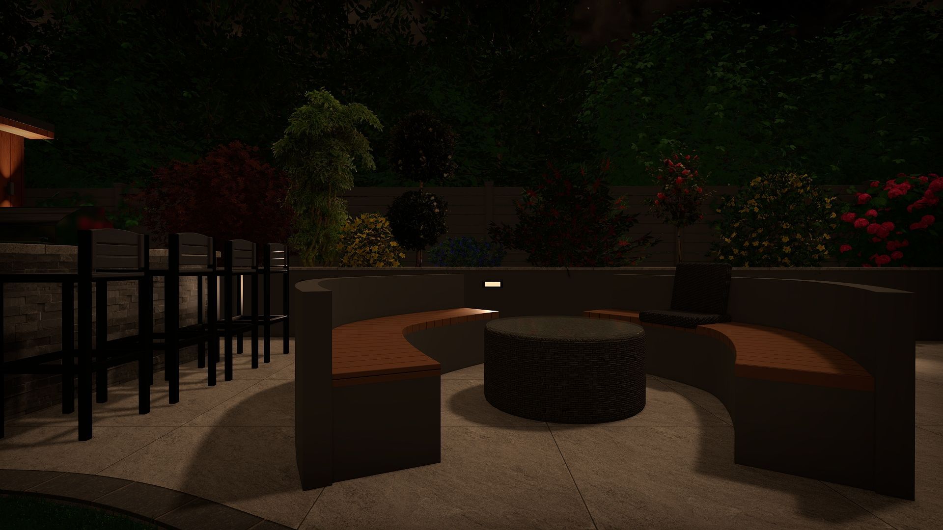 Nighttime outdoor patio with curved seating, round table, and garden backdrop.