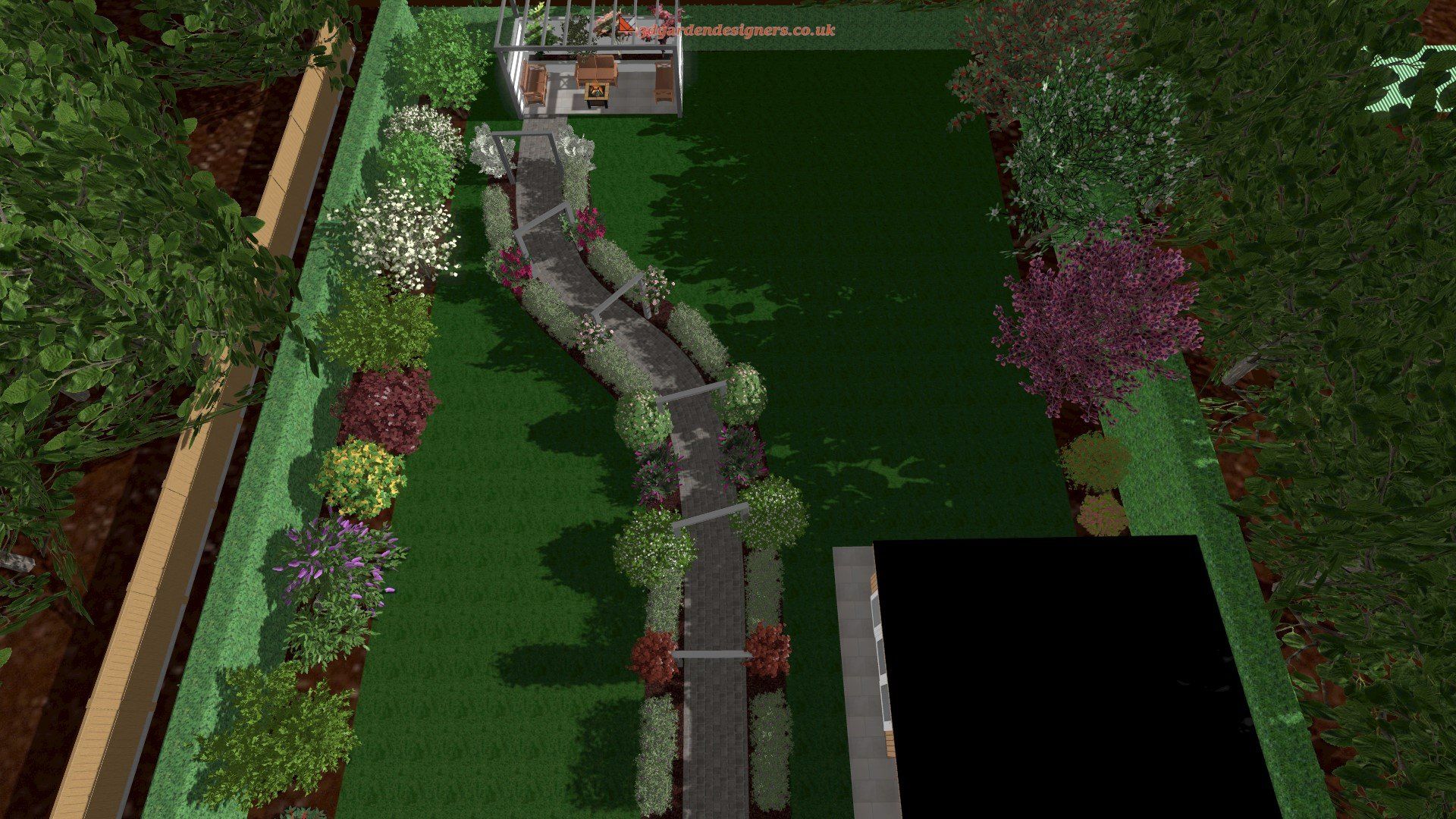 An aerial view of a garden with a path and trees.