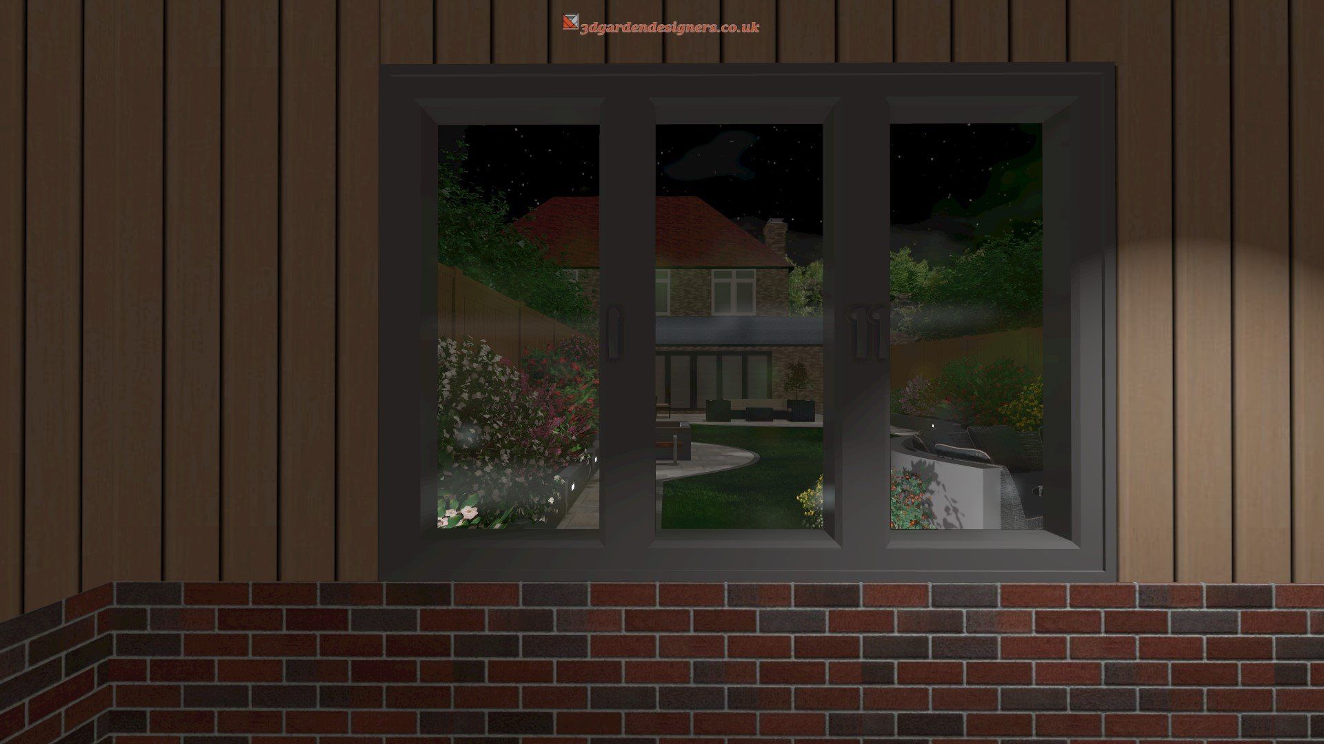 A brick wall with a window looking out to a house at night.