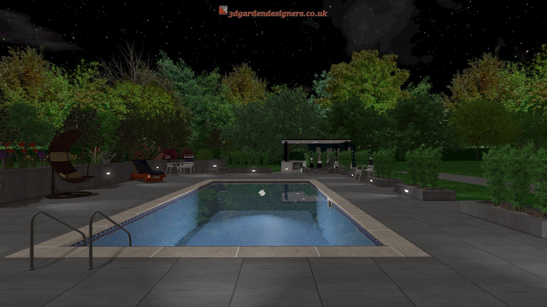 A large swimming pool is lit up at night in a backyard surrounded by trees.
