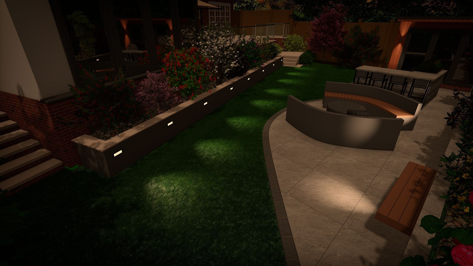 A nighttime garden with a lit lawn, flowerbeds, seating, and pathway.
