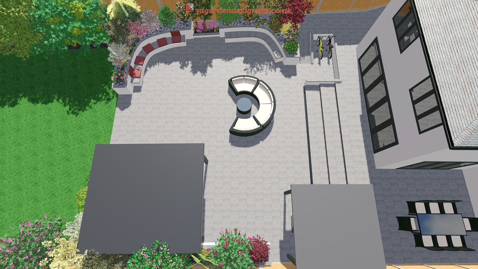 Overhead view of a modern backyard with patio furniture, a curved sitting area, and landscaping.