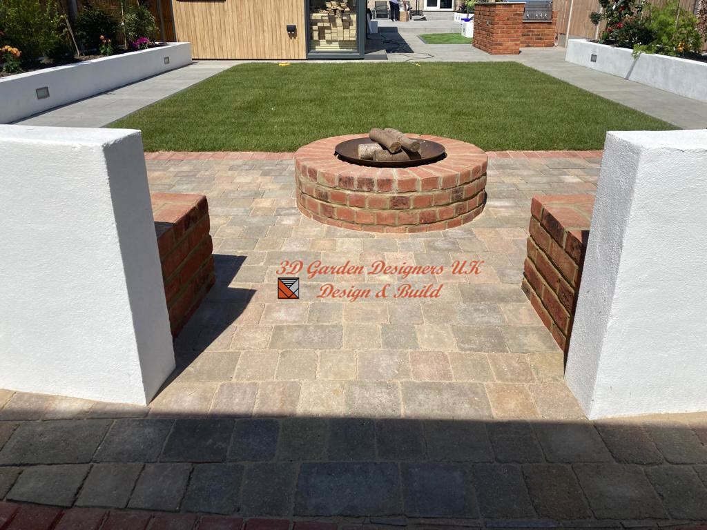 There is a fire pit in the middle of the patio.