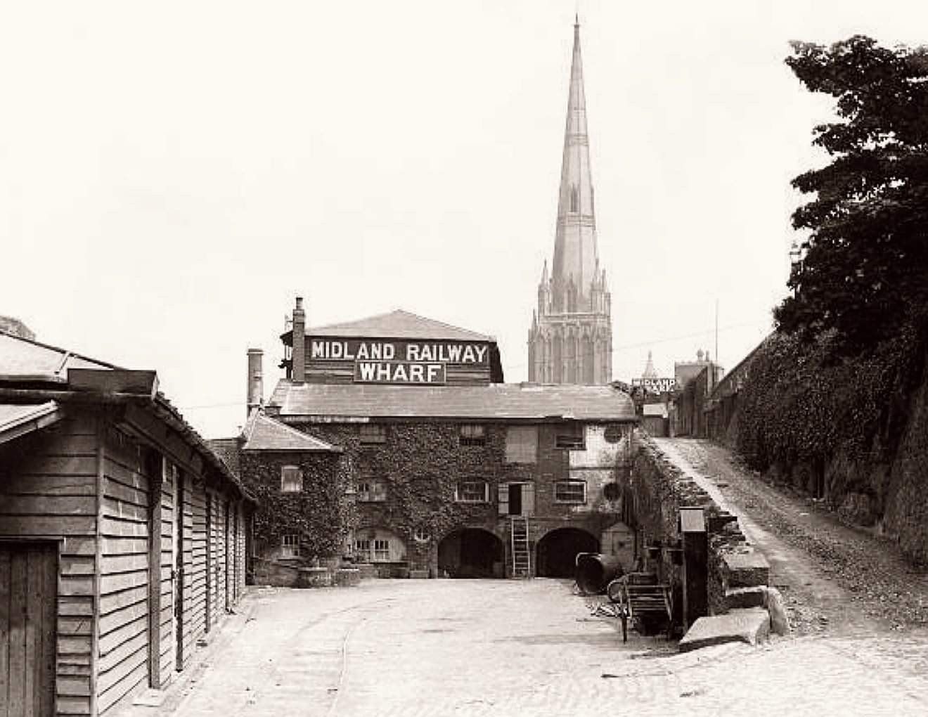 A historical photograph of Midland Railway Wharf and St Mary Redcliffe Church
