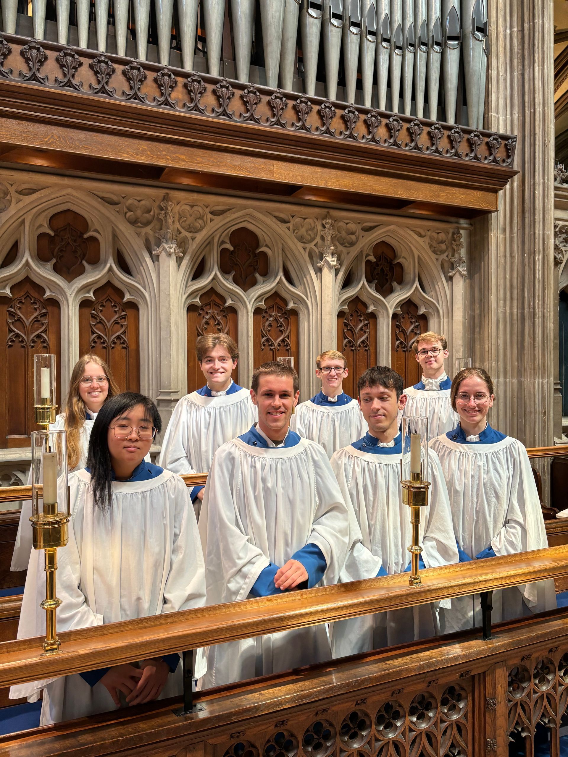 An image of the choir rehearsing in their choir stalls