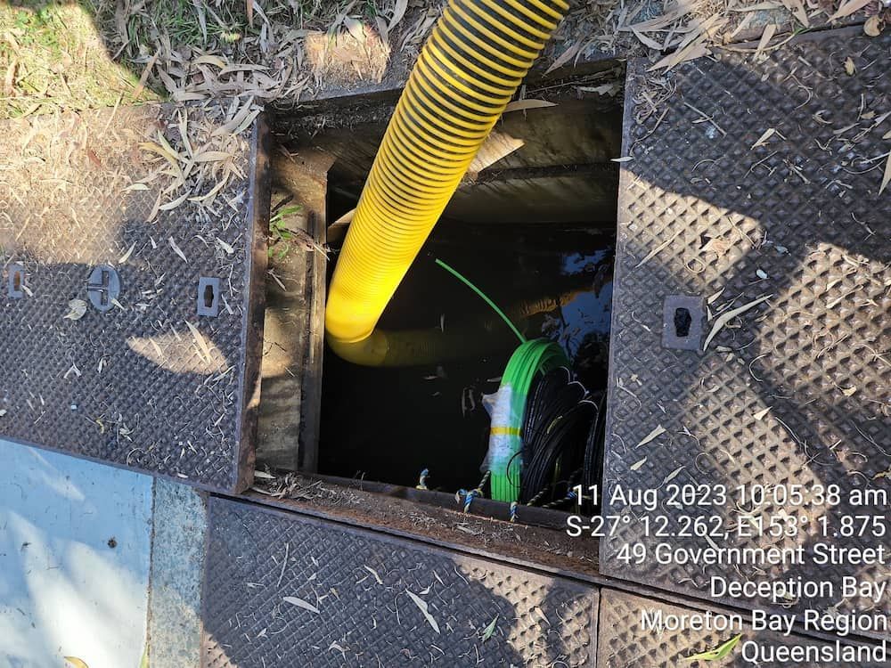 A Couple Of People Are Swimming In The Ocean On A Beach — ViperVac Solutions PTY LTD in Bowen, QLD
