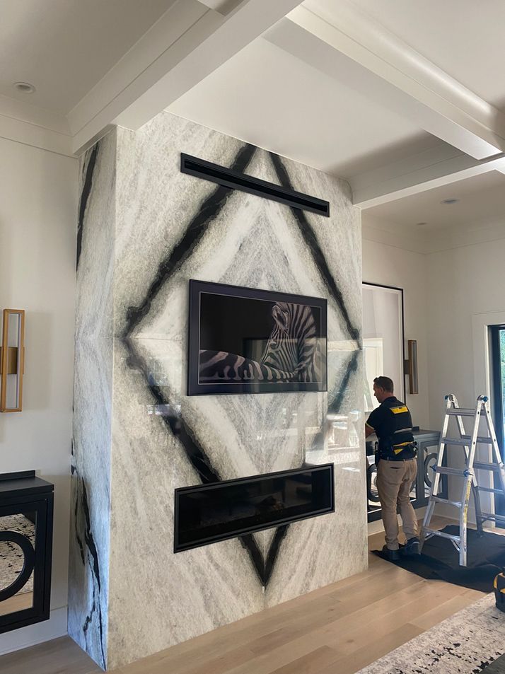 Worker Hanging the Artworks on Wall — Leavenworth, KS — Ready Set Hang