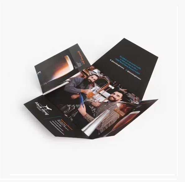 a brochure with a picture of two men on it