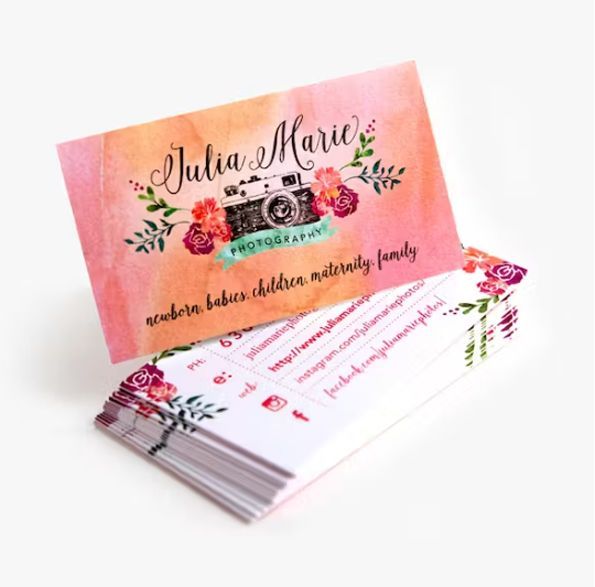 a stack of business cards for julia marie