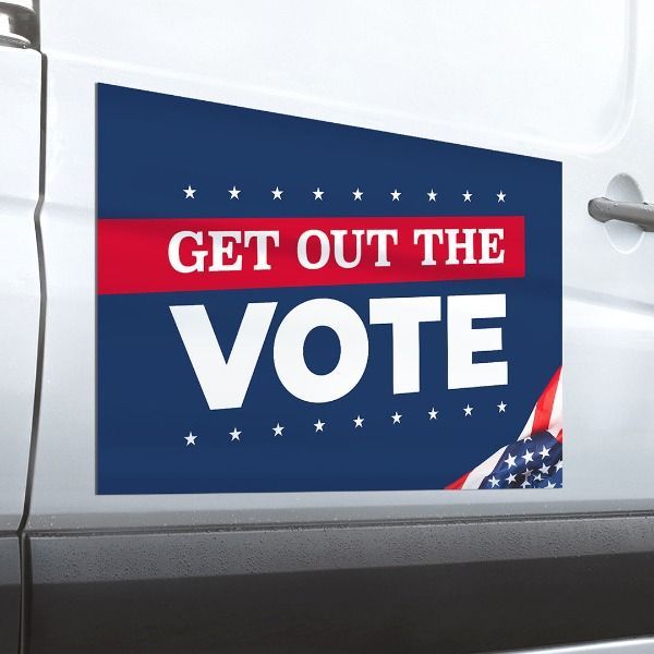 a get out the vote sign on the side of a white van