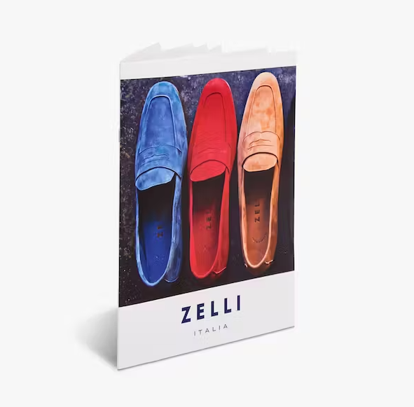 a greeting card with three different colored loafers on it