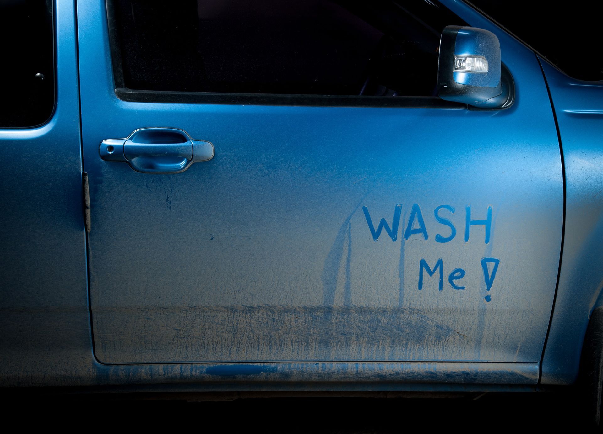 Dirty Car that Needs Exterior Detailing that says Wash Me