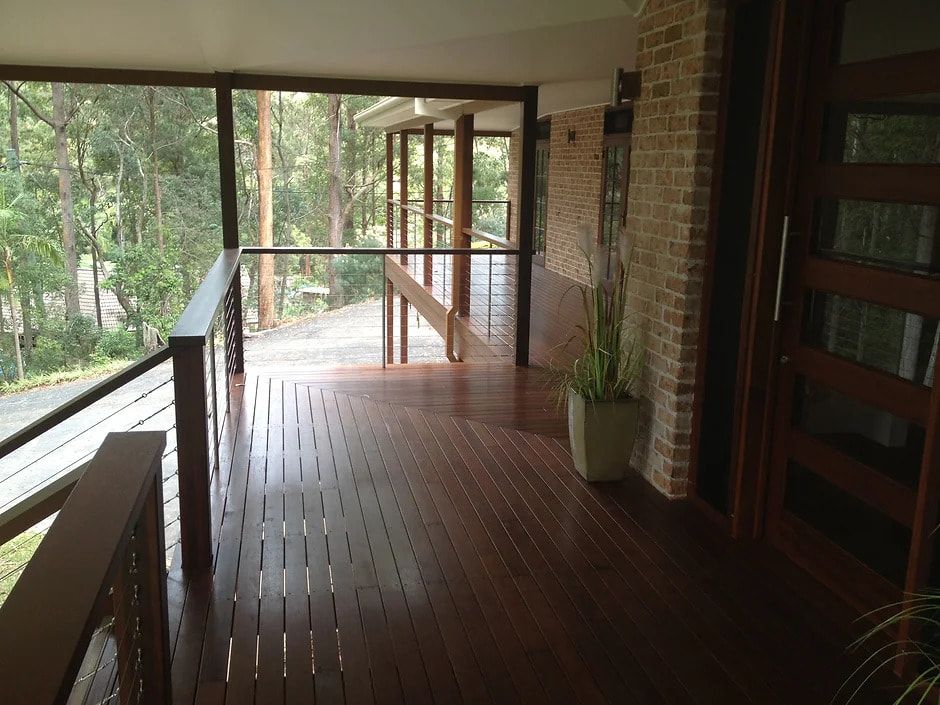A Wooden Deck With Stairs Leading Up to It — D.J. Decks in Sapphire Beach, NSW