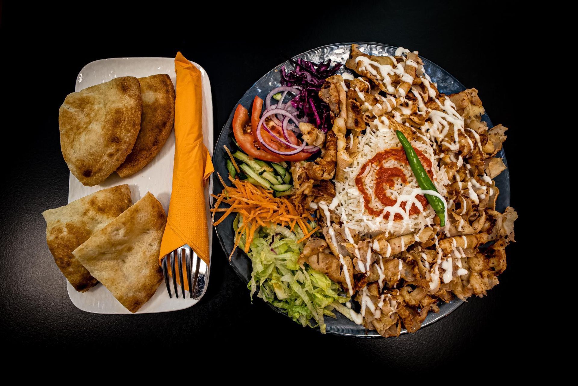 K2 Since 1983 KEBAB e PIZZA TACOS CHICKEN