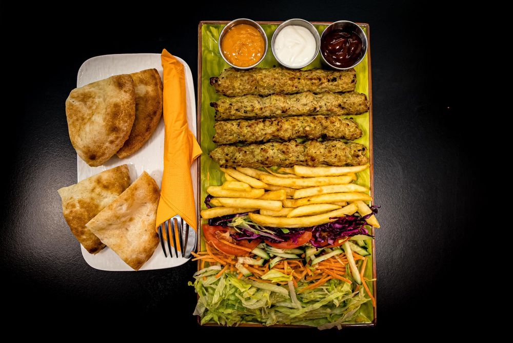 K2 Since 1983 KEBAB e PIZZA TACOS CHICKEN