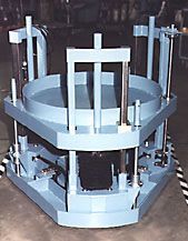 A blue helicopter is parked in a field.