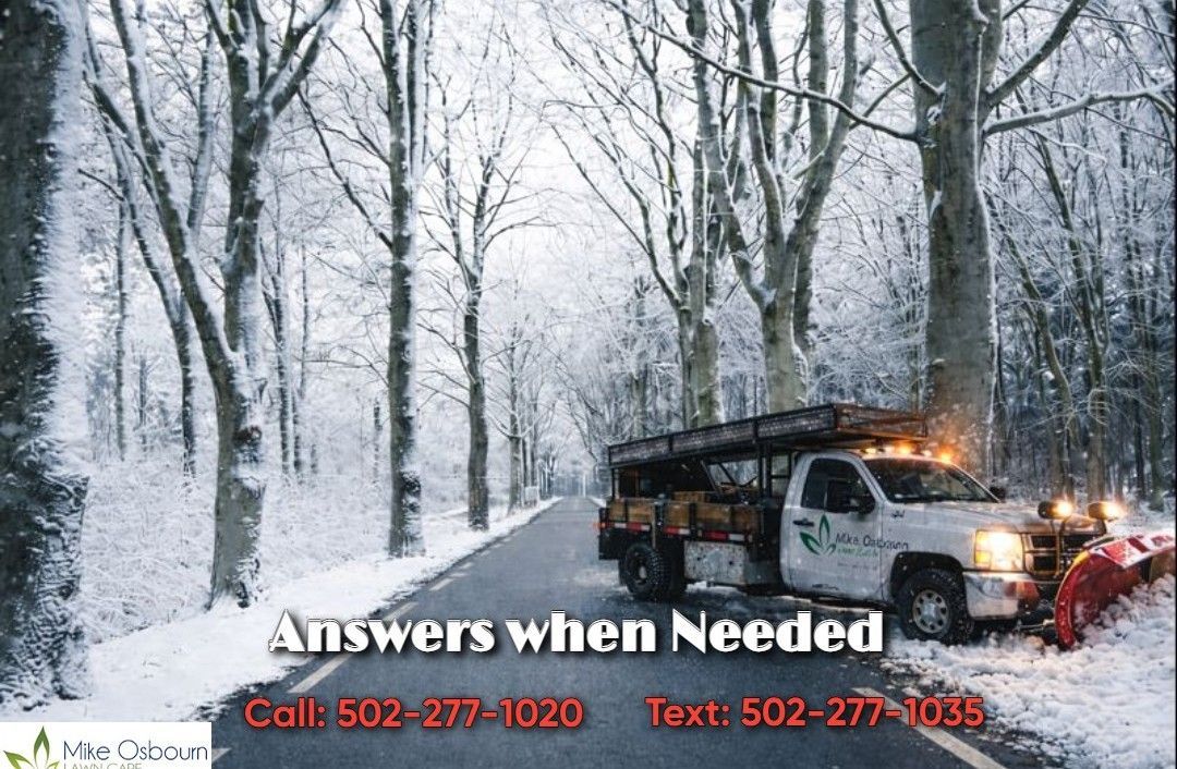 A snow plow is parked in front of a pharmacy