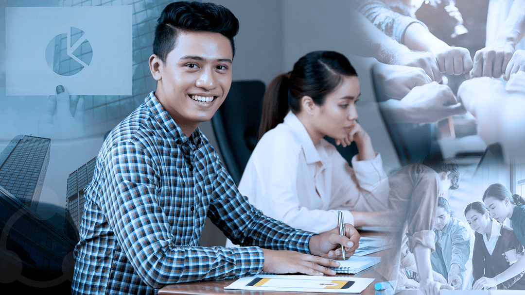 Smiling man working at a desk, another person beside him. Business-themed overlay with chart and hands.