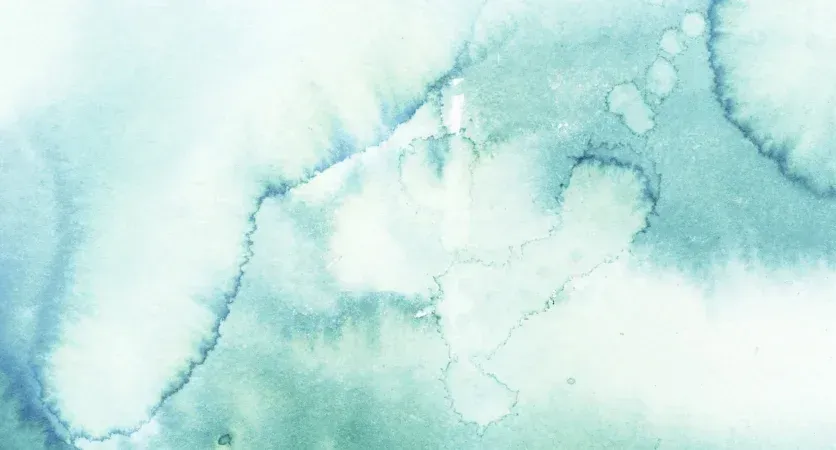 A close up of a blue and white watercolor painting on a white background.