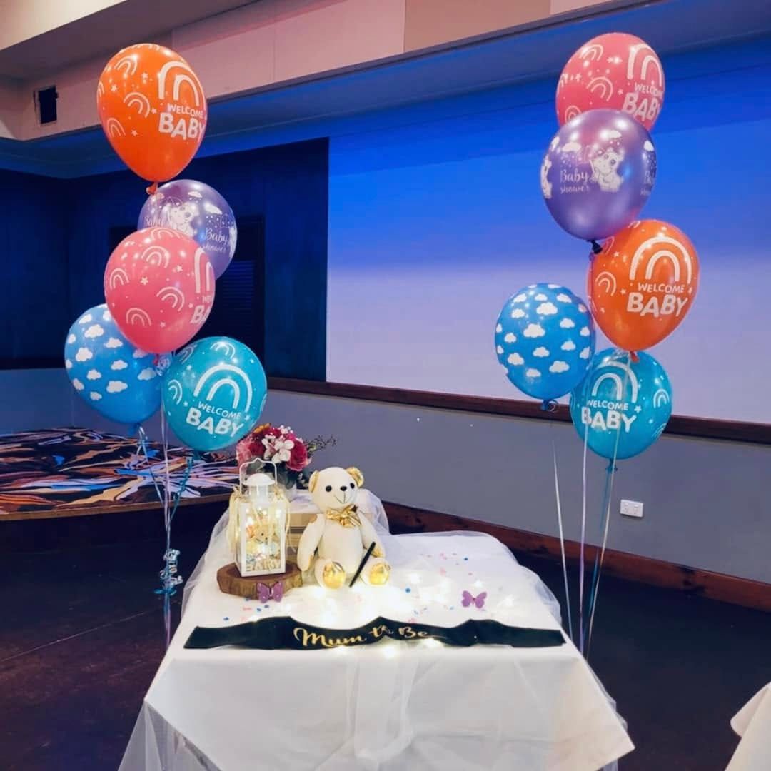 Balloons and Teddy Bear Decorate a Table for a Baby Shower — Creative Events Innisfail in Innisfail, QLD
