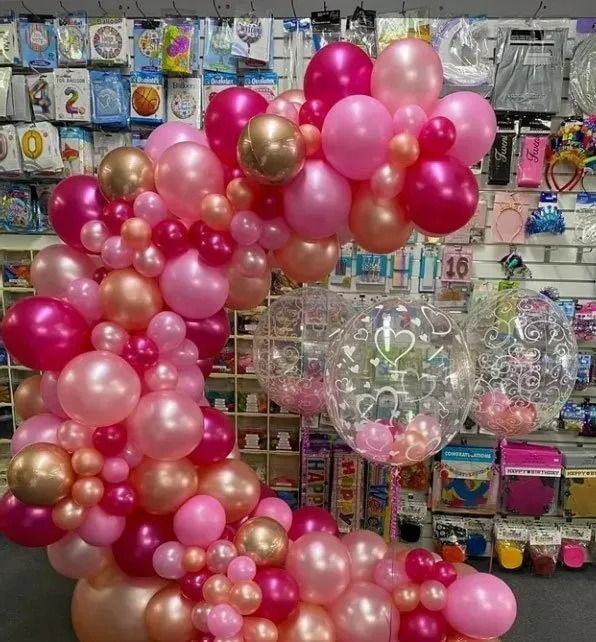 Pink and Gold Balloon Arch, Including Bubble Balloons — Creative Events Innisfail in Innisfail, QLD