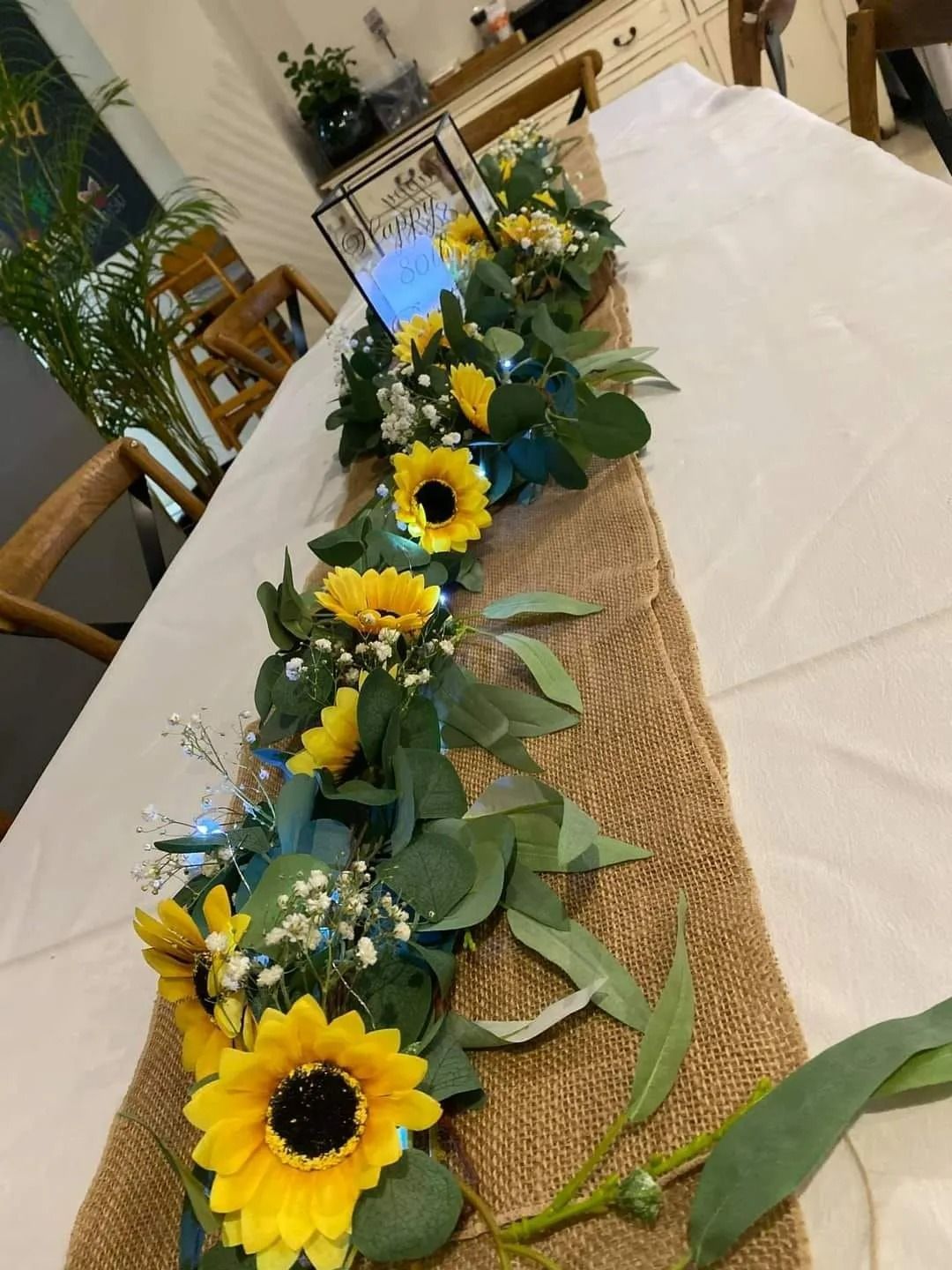 Table Centerpiece With Sunflowers, Greenery — Creative Events Innisfail in Innisfail, QLD