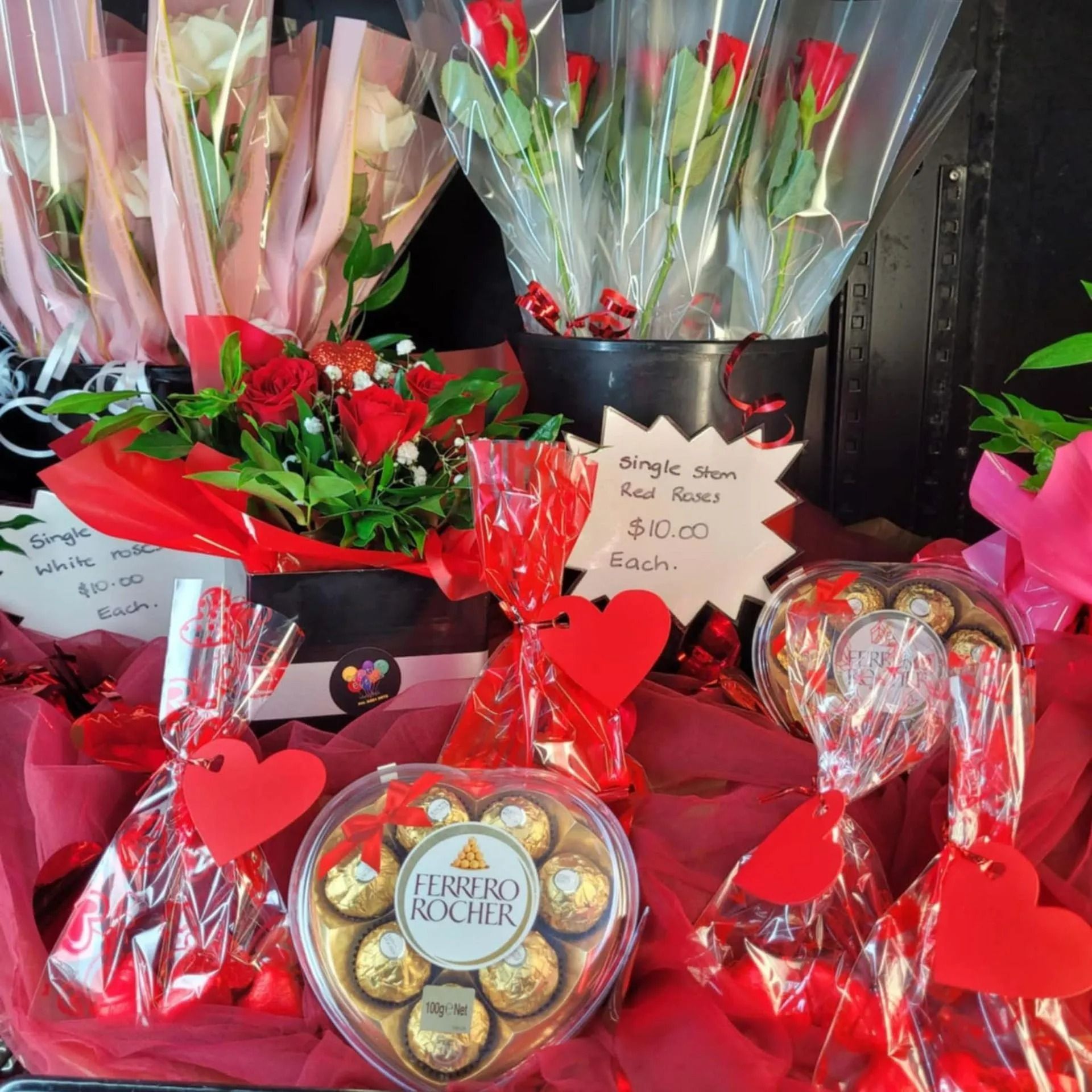 Valentine's Day Floral Arrangement With Roses, Candies, and Gift Bags — Creative Events Innisfail in Innisfail, QLD