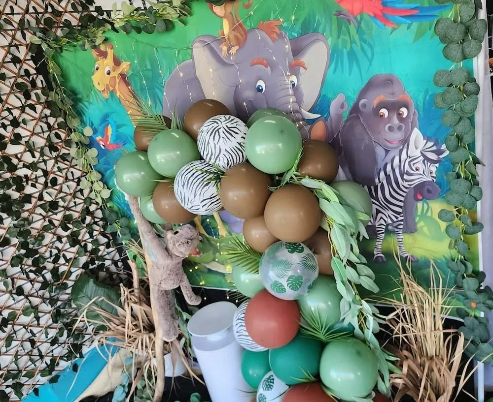 Jungle-themed Party Decoration With Balloons, Animal Cutouts, and Greenery — Creative Events Innisfail in Innisfail, QLD