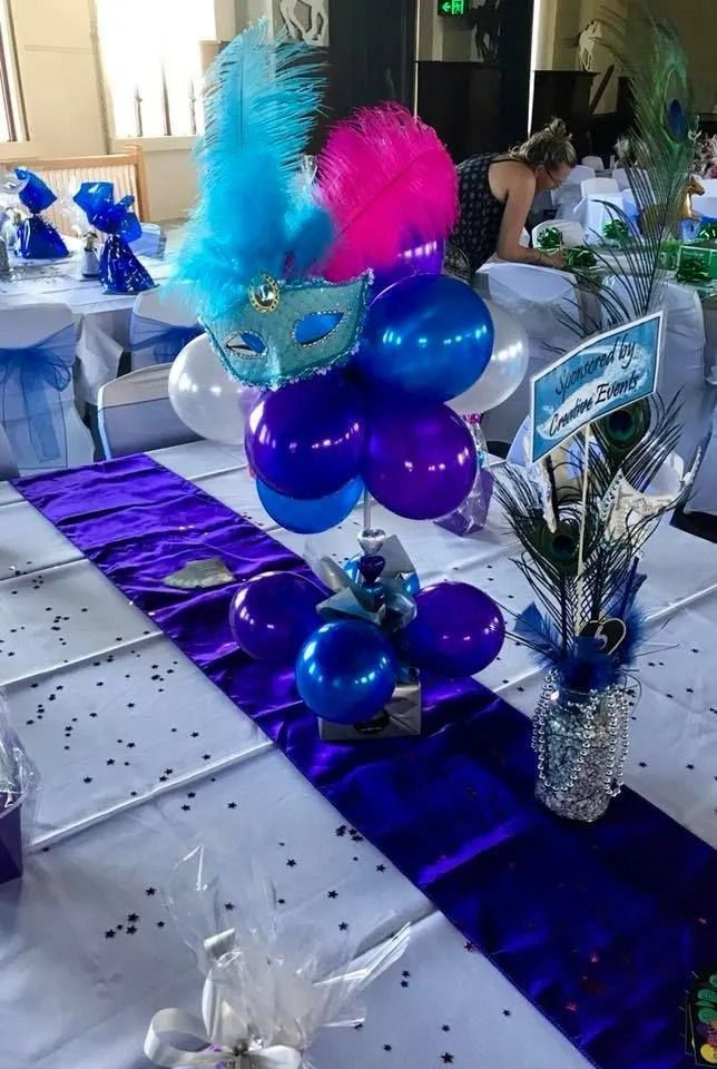 Centerpieces With Blue, Purple, and Pink Decor on a Table With a Purple Runner — Creative Events Innisfail in Tully, QLD