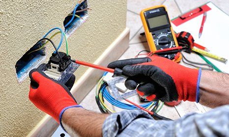 Electrician — Man Working on Electric Circuit in Grants Pass, OR