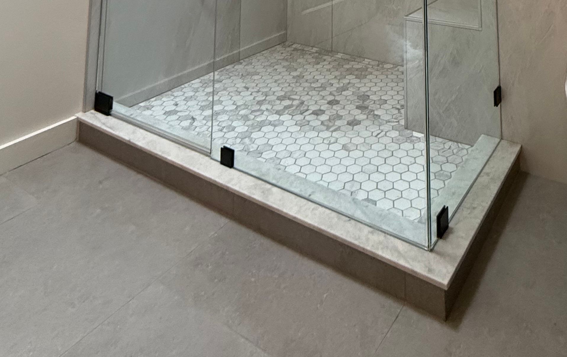 finished shower curb bathroom remodel